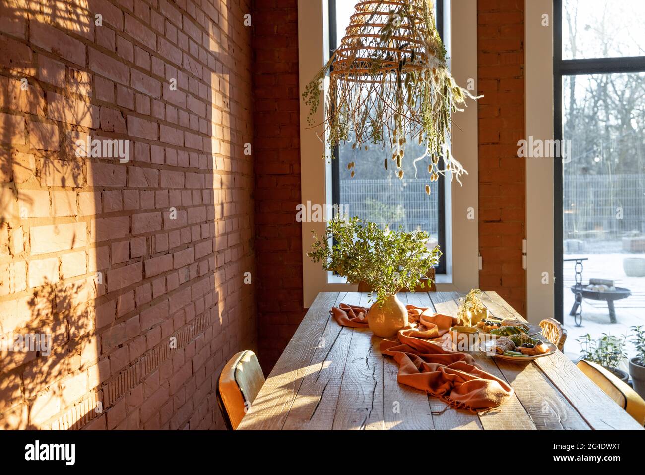 Dining place with a wooden table Stock Photo