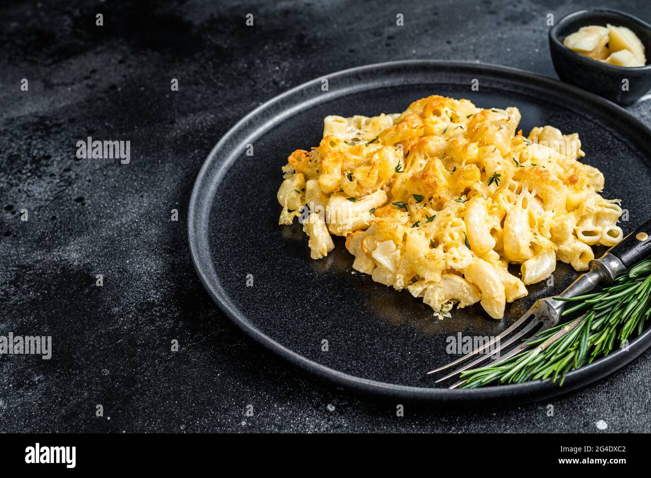 Baked Macaroni Mac and cheese American dish with Cheddar cheese sauce