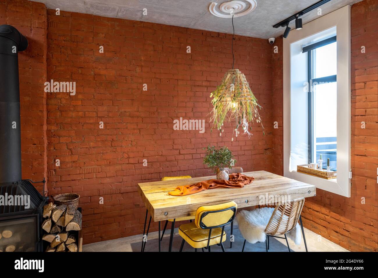 Dining place with a wooden table Stock Photo