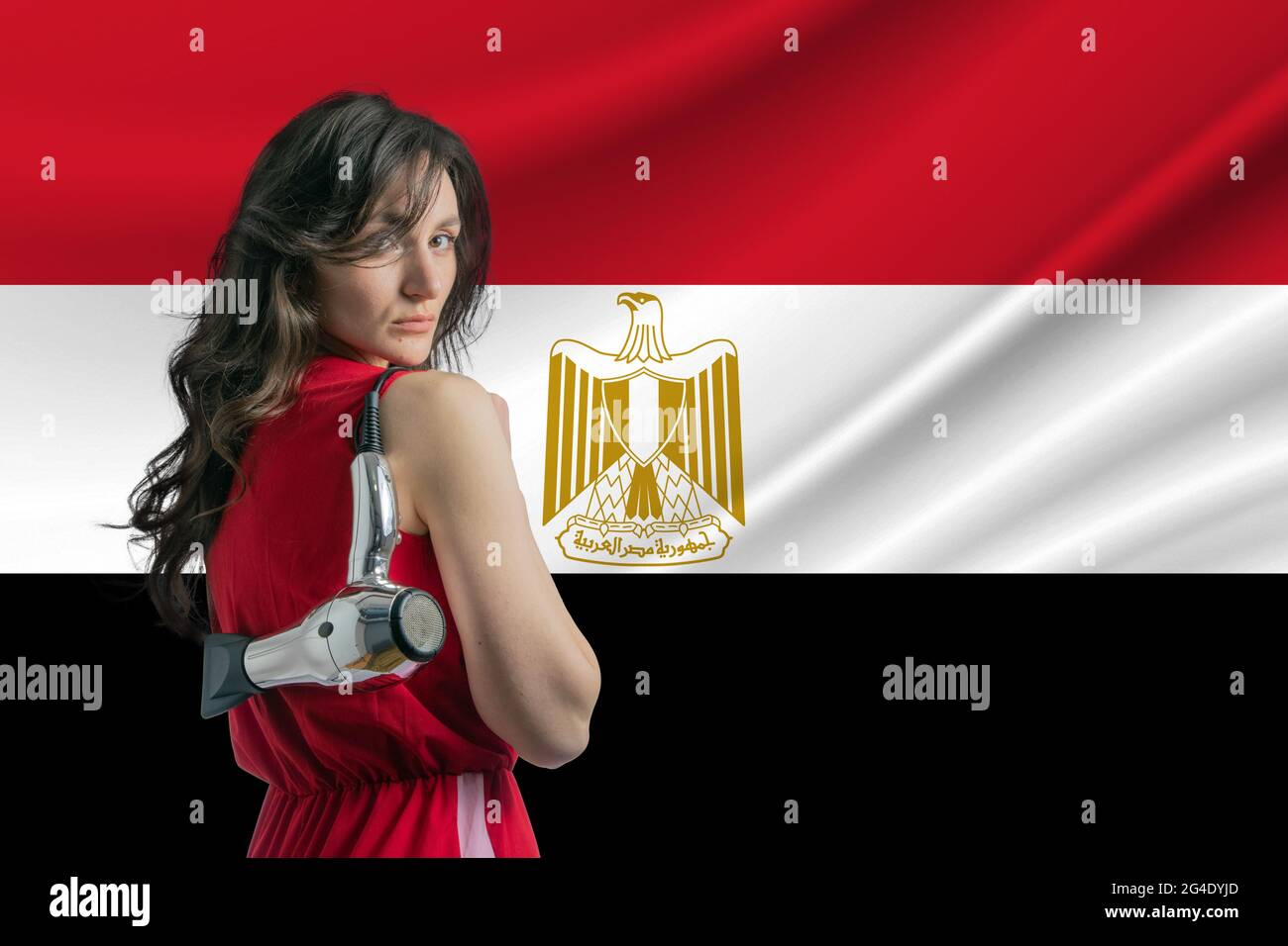 Beauty industry in Egypt Happy female hairdresser holding hairdryer
