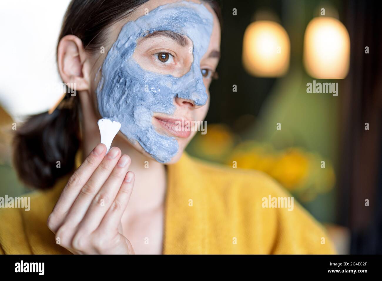 Woman cleansing skin in hi-res stock photography and images - Alamy