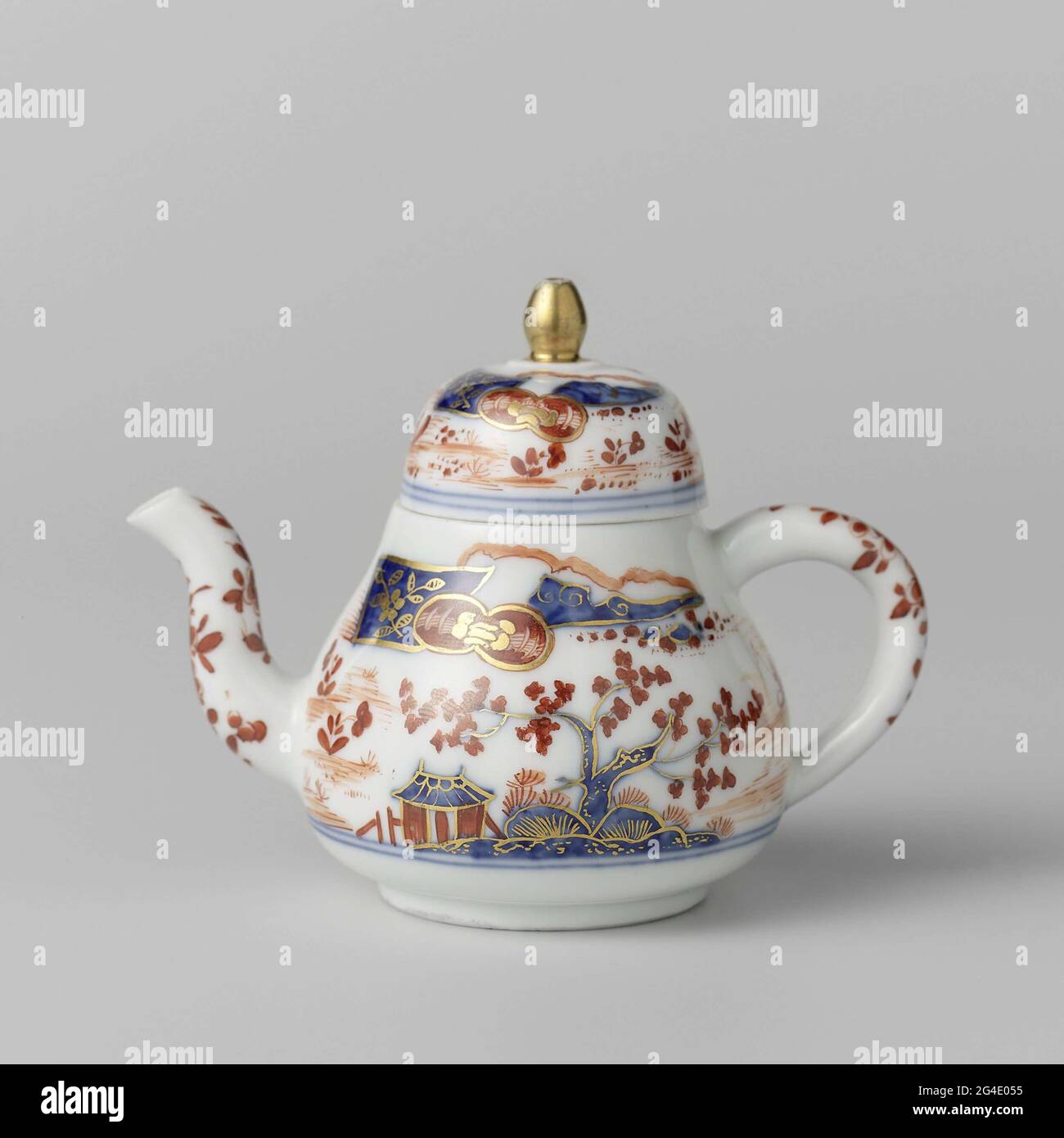 . Teapot with lid of painted porcelain. The teapot is painted in the Imii style with trees, houses and a fisherman in a boat. The teapot has been marked. Stock Photo
