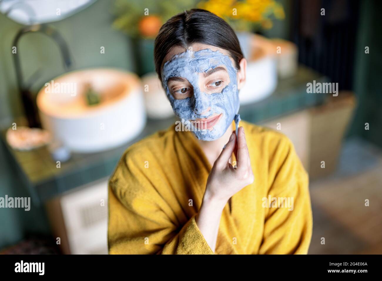 Woman purifying mask hi-res stock photography and images - Alamy