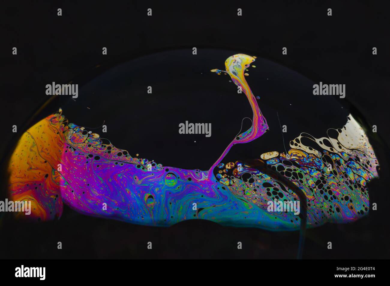 Beautiful psychedelic abstractions on the surface soap bubbles Stock Photo