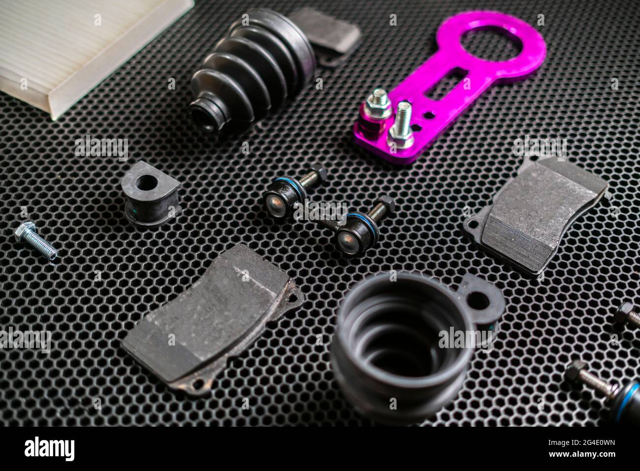new car spare parts collection flat lay on dark background, change ...