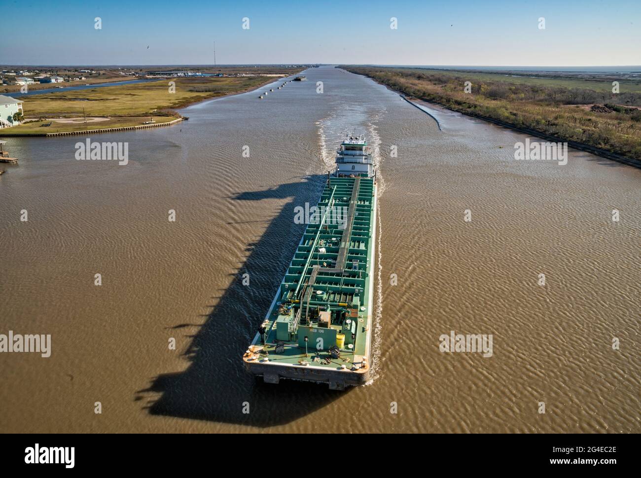 Barge at Intracoastal Waterway, view from highway bridge in Matagorda, Texas, USA Stock Photo