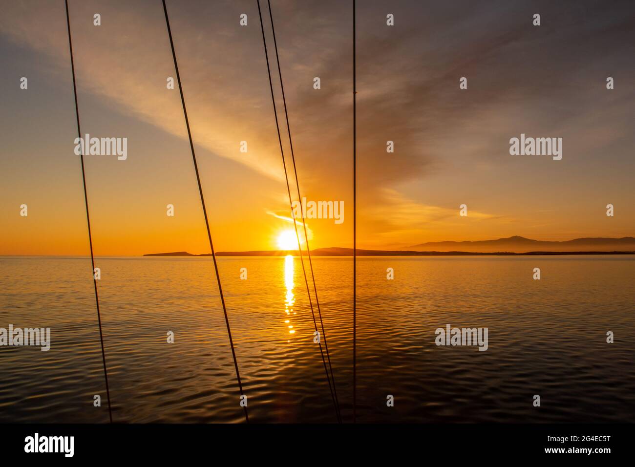 Sunset over boat on sea hi-res stock photography and images - Alamy