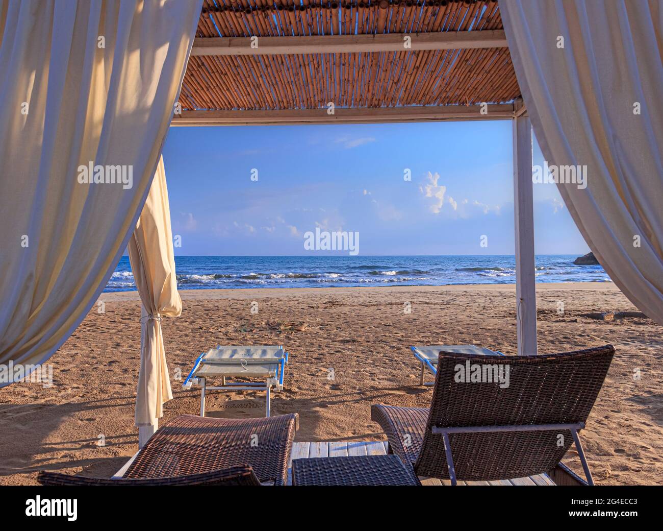 White beach canopies. Luxury beach tents at a resort in Apulia, Italy