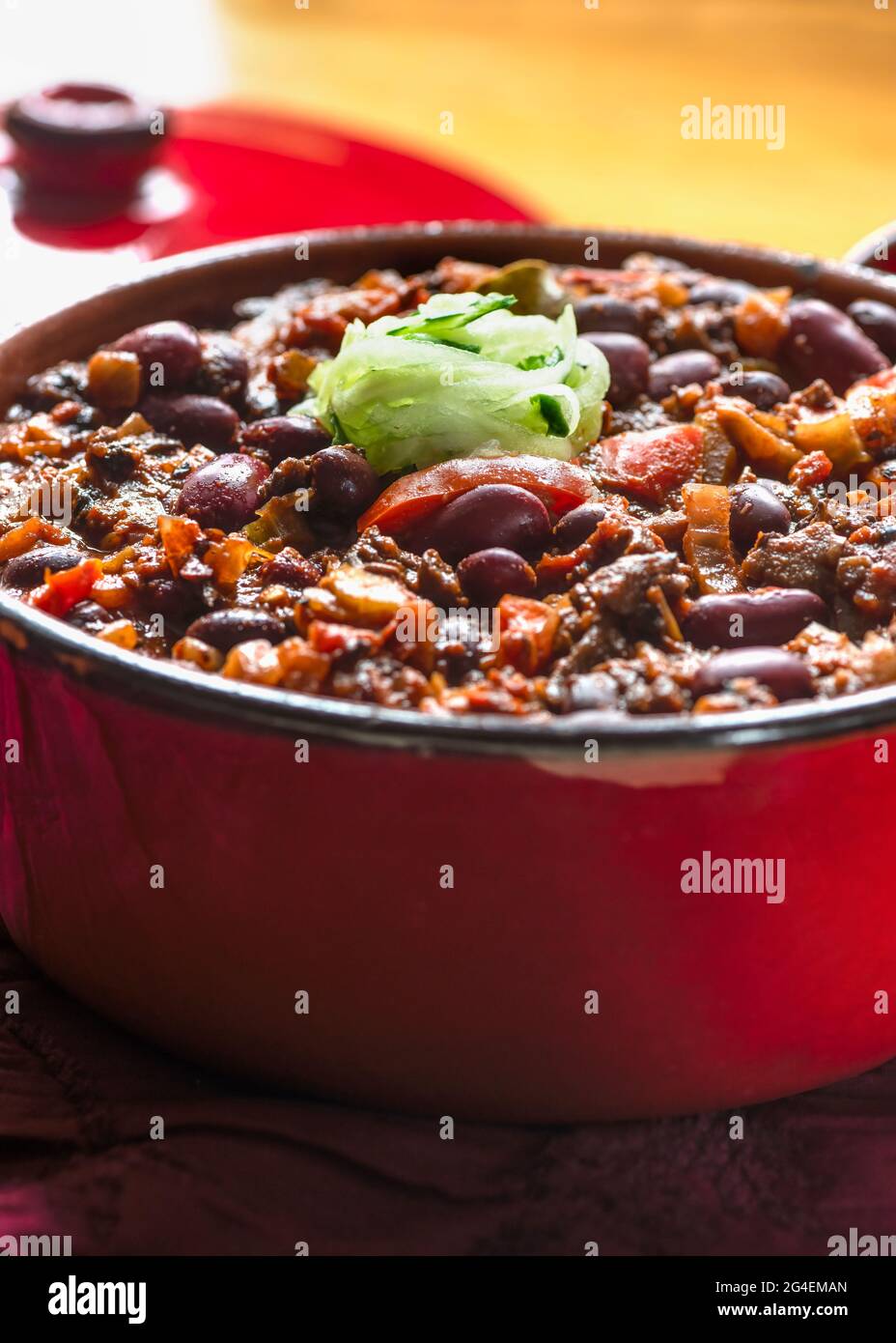 freshly made slow cooked chilli con carne in large family cooking pot