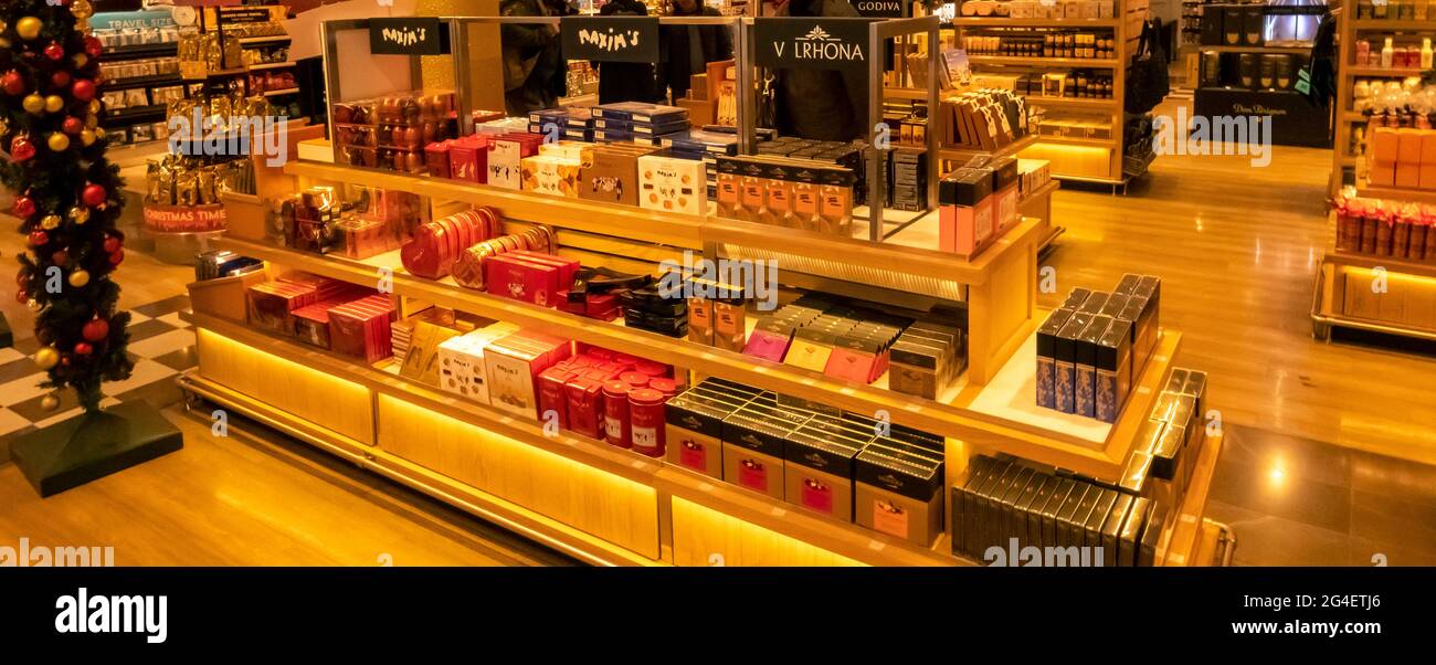 Paris, France - september 18, 2020 . Maxim's products on sale in duty free shop at Paris airport, France. Famous brand of food, french landmark Stock Photo