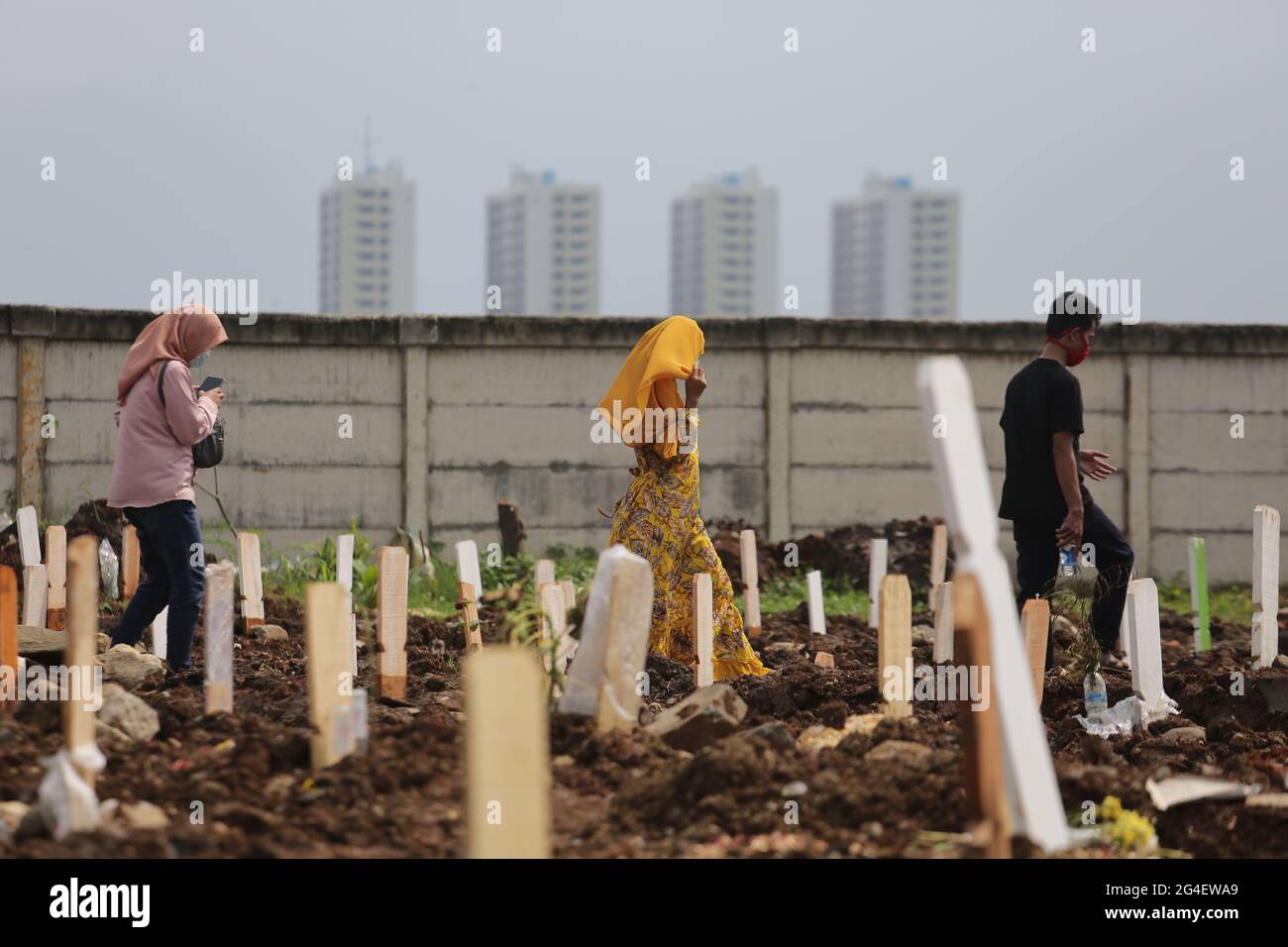 Jakarta, Indonesia. 21st June, 2021. Covid-19 Funeral at Rorotan Public Cemetery, Cilincing ...