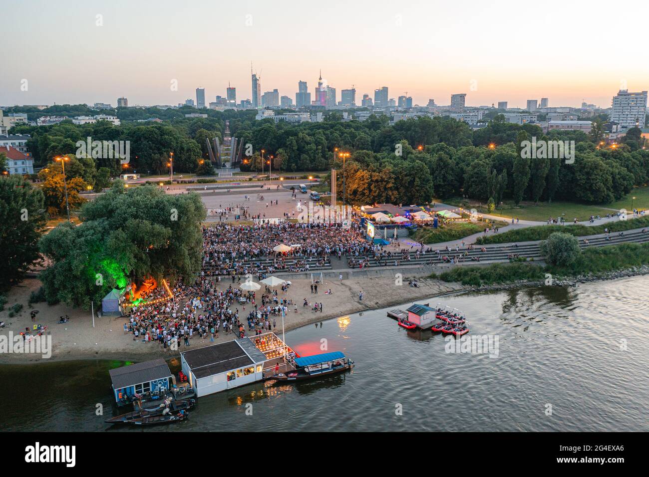 Euro 2020 fan zone, fans watching footbal match between Poland and Spain on large screen Stock Photo