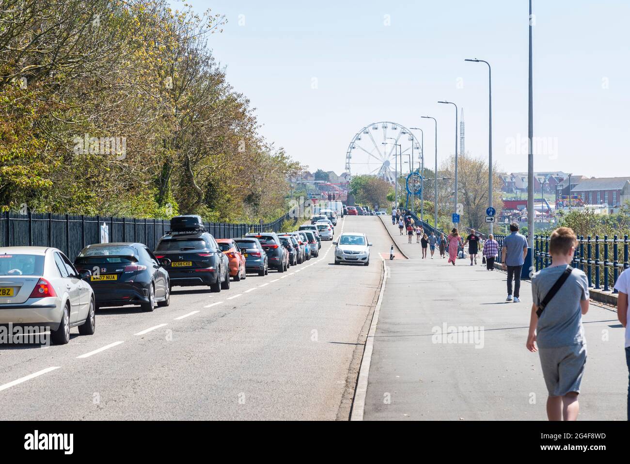 Cars queueing on the road to the seaside resort of Barry Island on a sunny Spring Bank Holiday. Stock Photo