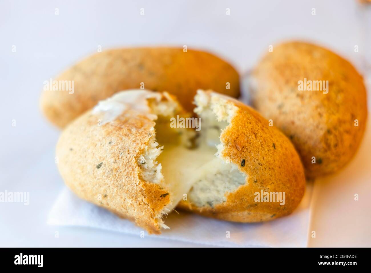 Delicious cod fish cake stuffed with cheese served in Porto, Portugal