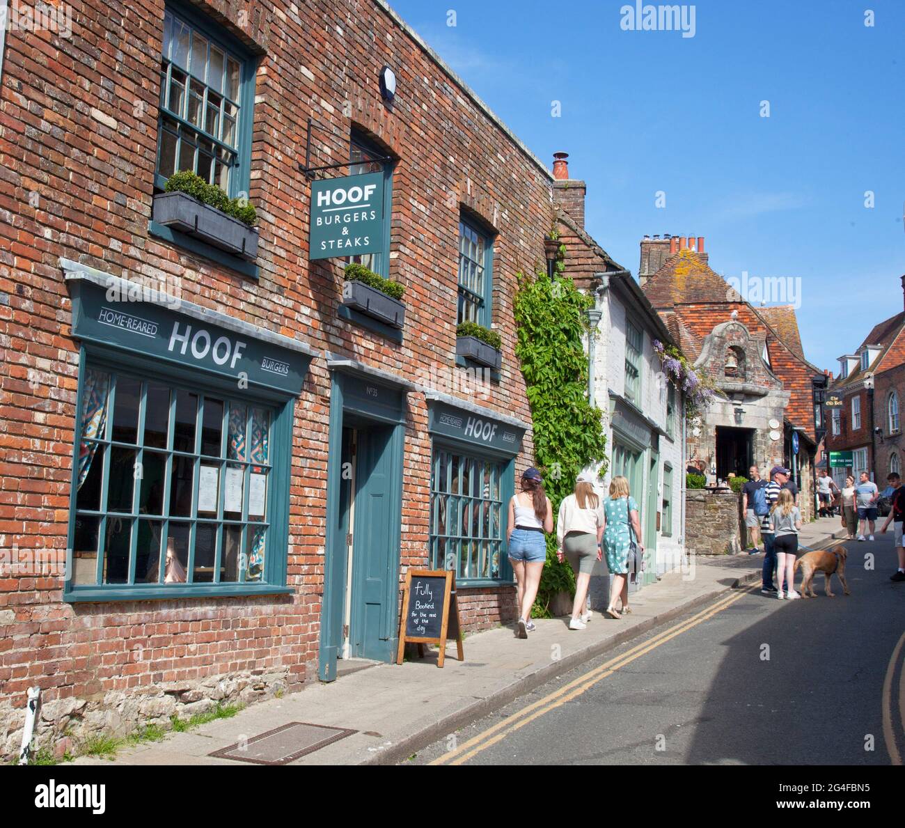 Town of Rye in Kent, England, featuring Hoof restaurant and the Old Bell pub in background.  June 2021 Stock Photo