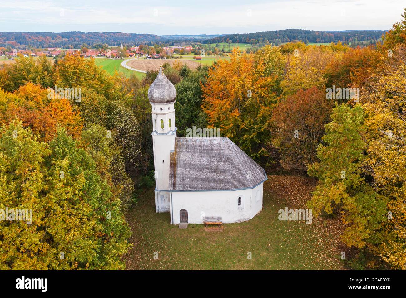 Chapel of St. George, Schimmelkapelle, autumnal forest, Ascholding near Dietramszell, Toelzer Land, drone shot, Upper Bavaria, Bavaria, Germany Stock Photo