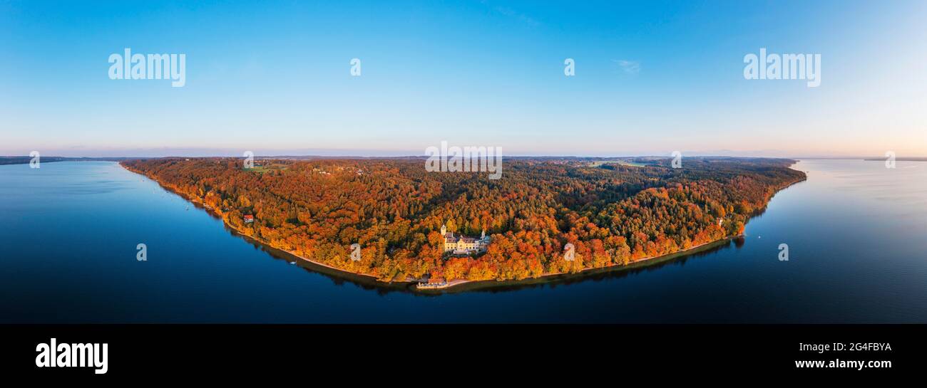 Panorama, Seeburg Castle at Lake Starnberg in the evening light, near Muensing, autumnal mixed forest, Fuenfseenland, aerial view, Upper Bavaria Stock Photo