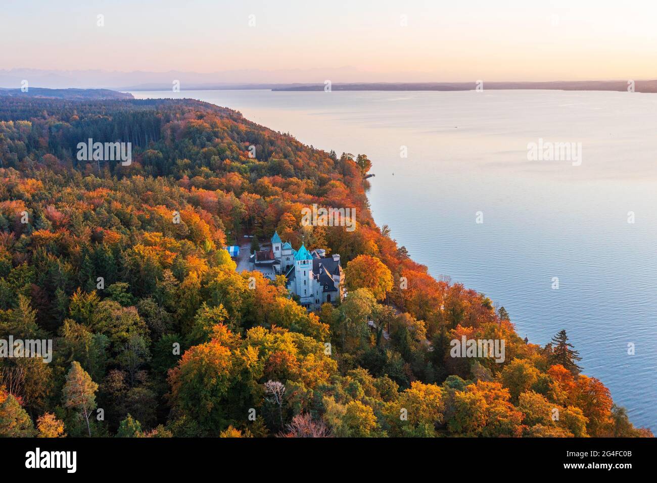Seeburg Castle at Lake Starnberg in the evening light, near Muensing, autumnal mixed forest, Fuenfseenland, aerial view, Upper Bavaria, Bavaria Stock Photo