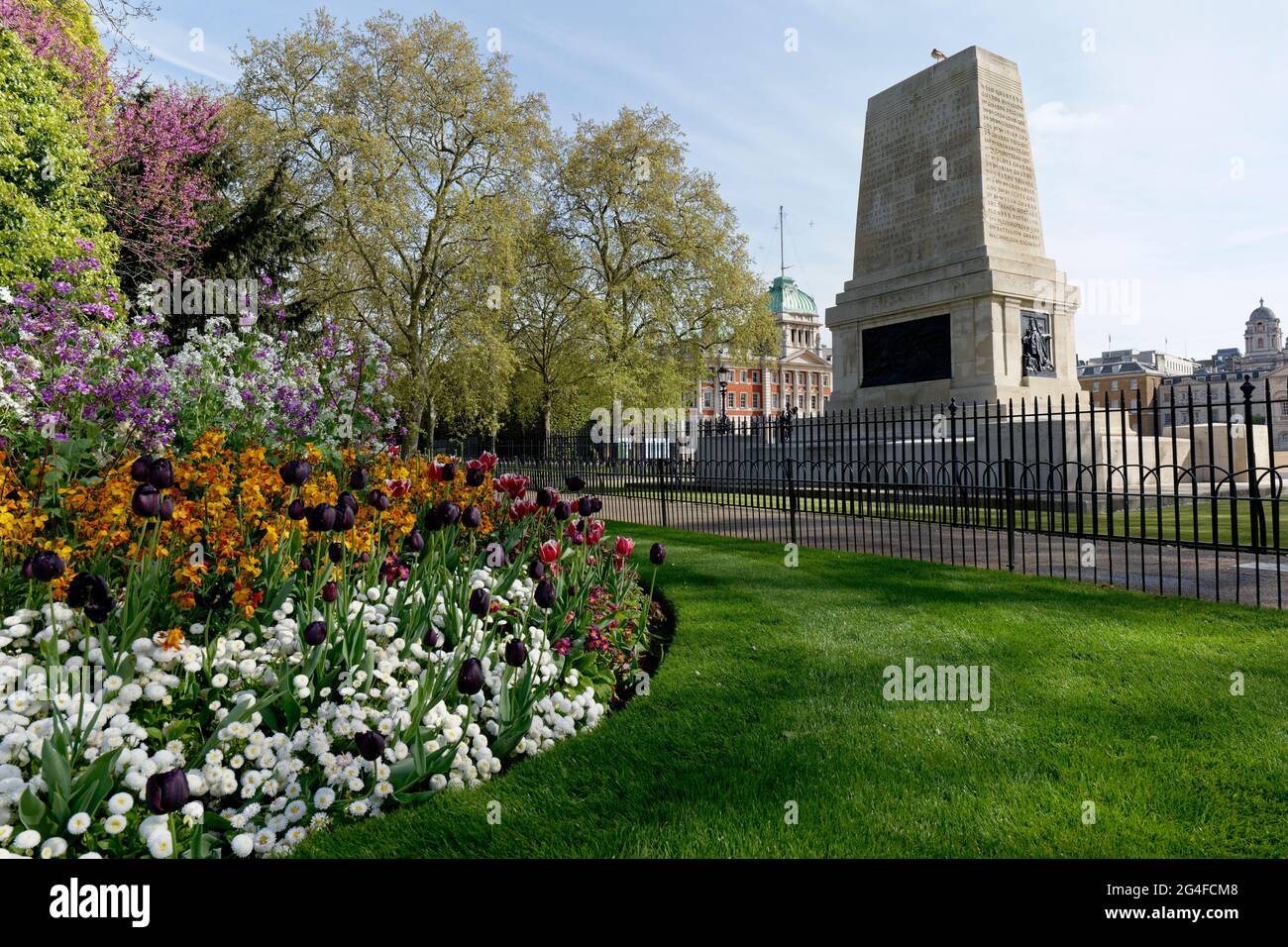 The Guards Memorial a large stone monument to the four British Guards regiments sits at the edge of St James's Park next to Horse Guards Parade Stock Photo