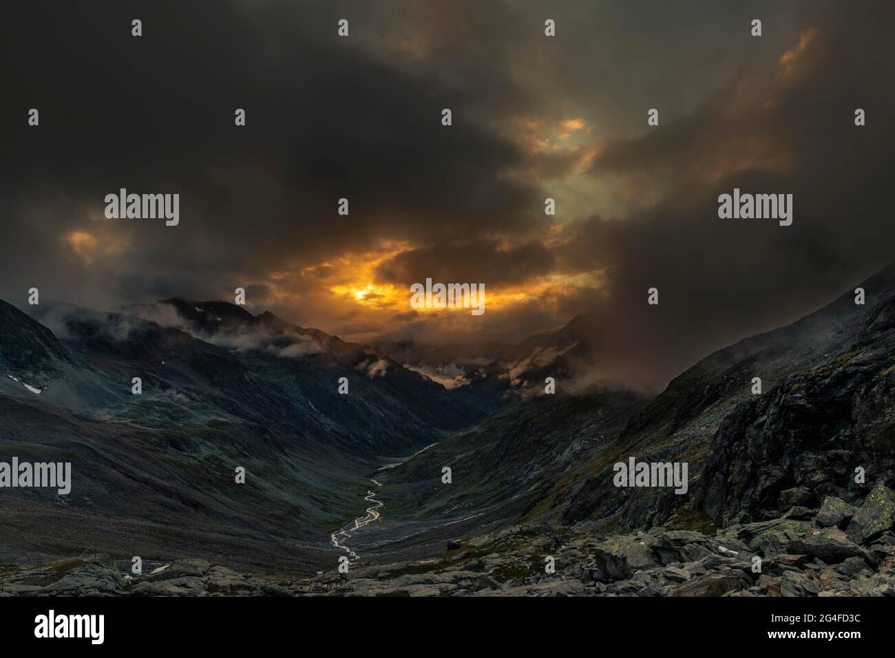 Sunset with dramatic clouds over Windbachtal, Soelden, Oetztal, Tyrol, Austria Stock Photo