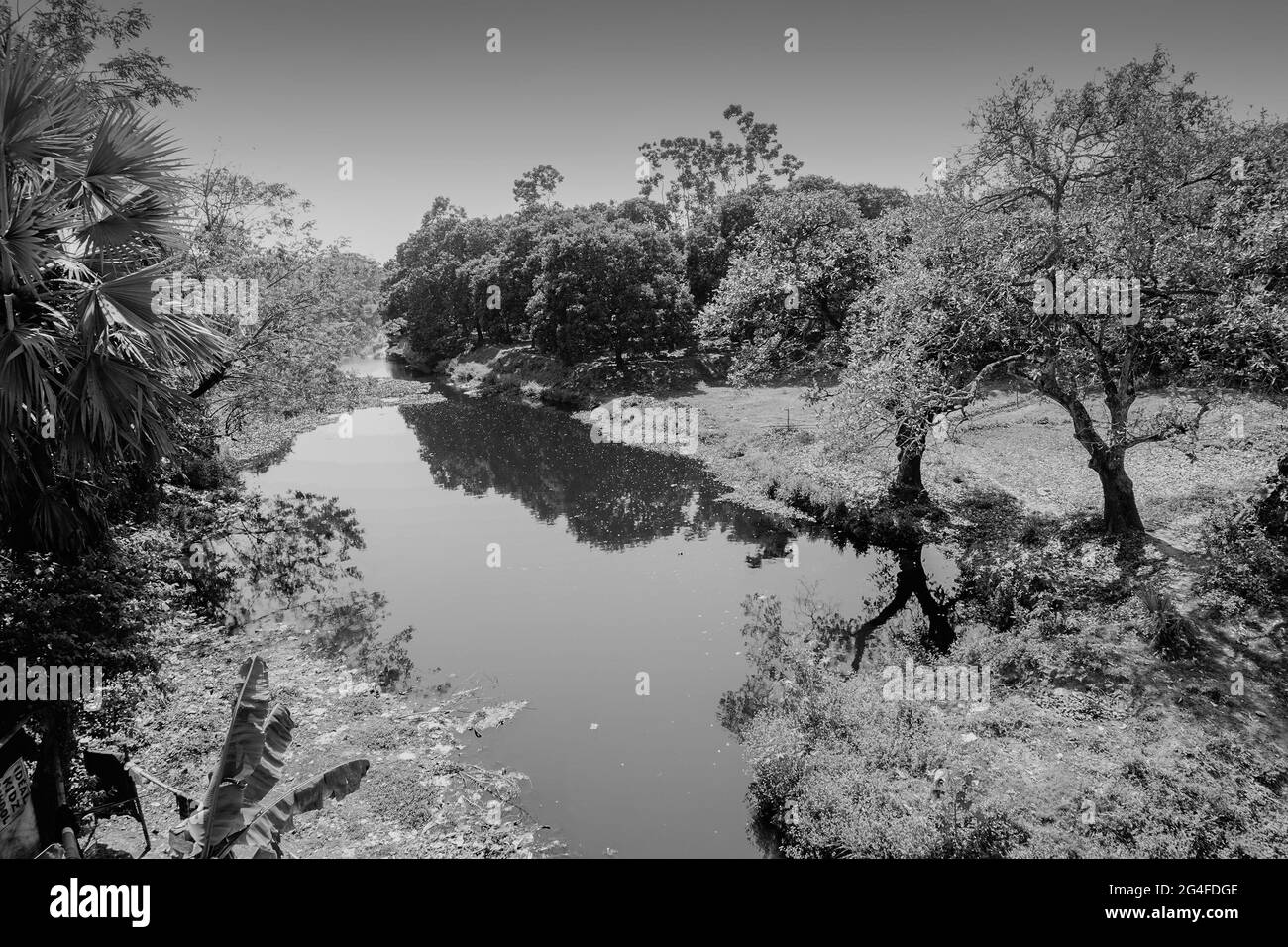 Indian village pond, black and white image shot at daytime in West