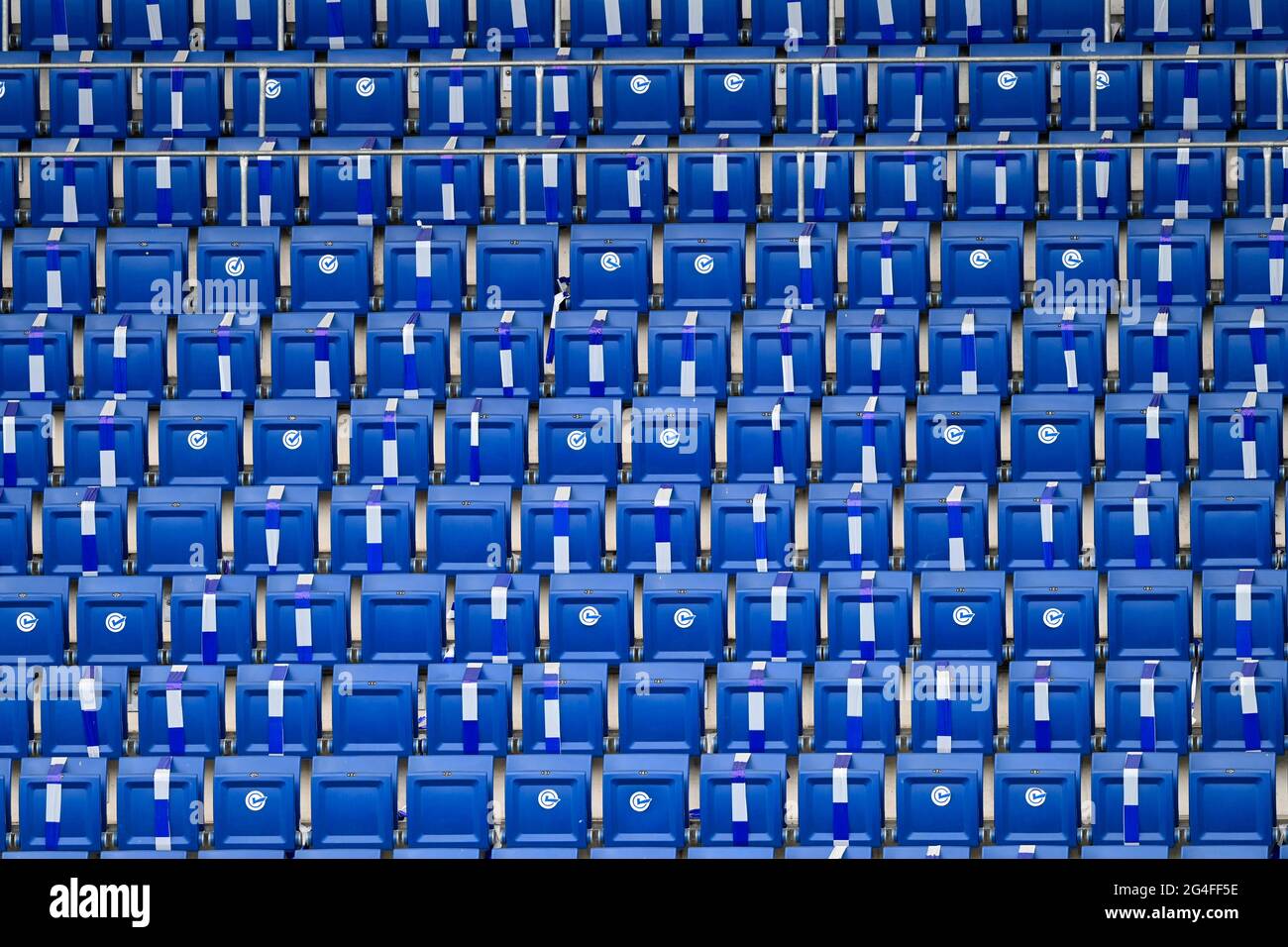 Empty rows of seats, labeled for Corona seating, grandstand, PreZero