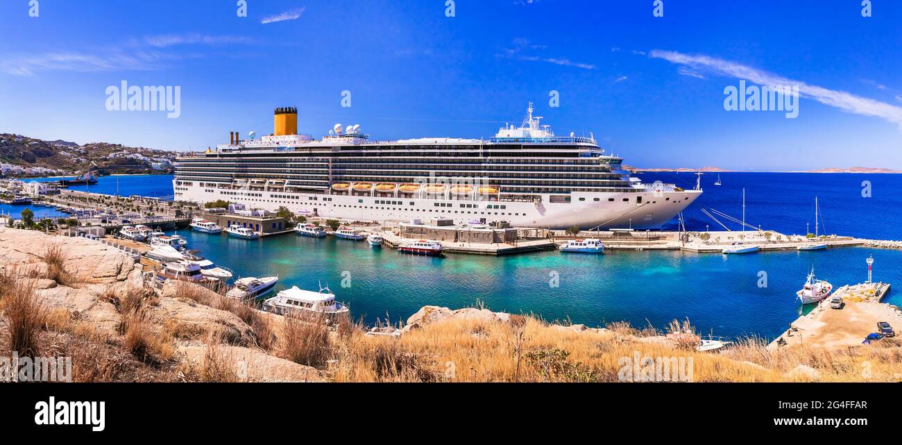 Cruise ship in port of Mykonos island. Greece travel. Mediterranean summer holidays Stock Photo