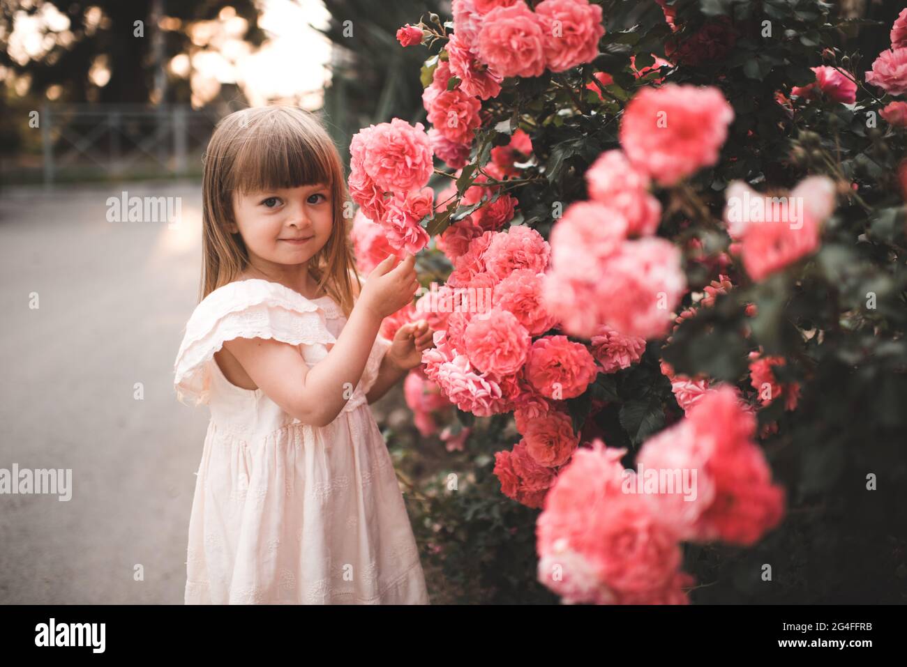 Smiling cute child girl 34 year old wear stylish dress posing with