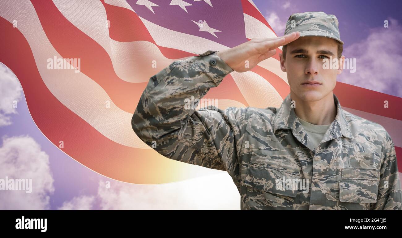 Composition of male soldier saluting over american flag Stock Photo - Alamy