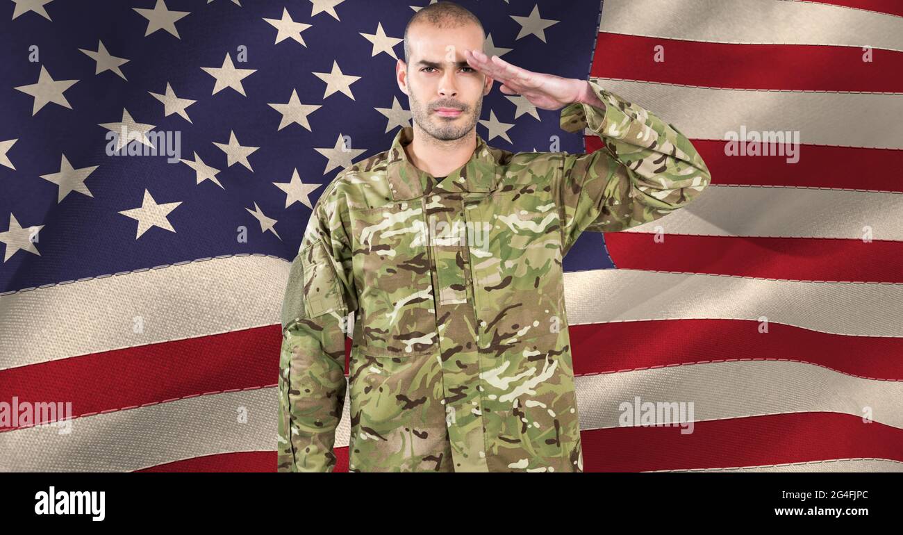Composition of male soldier saluting over american flag Stock Photo - Alamy
