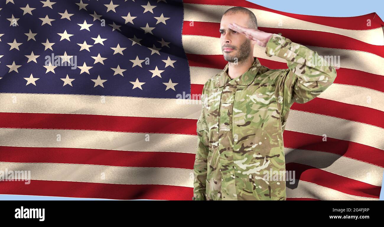 Composition of male soldier saluting over american flag Stock Photo - Alamy