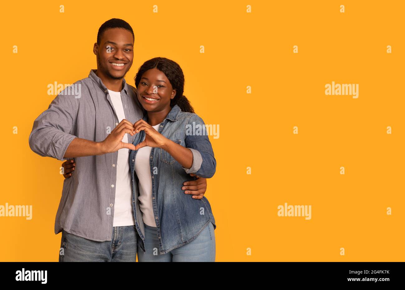 Portrait Of Happy Romantic Black Couple Making Heart Gesture With Their ...
