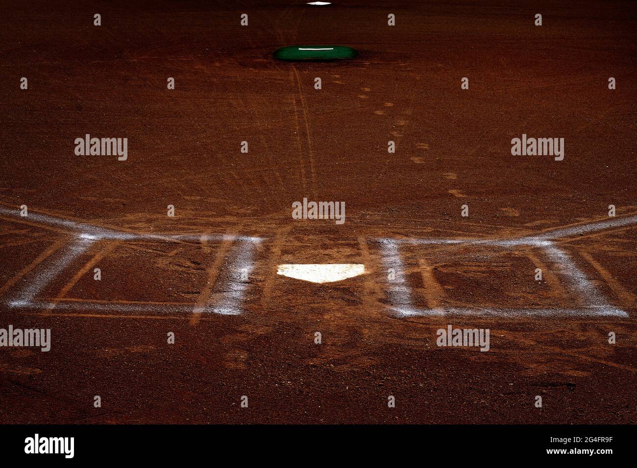 Baseball homeplate with batter box chalk lines in brown clay dirt Stock Photo Alamy