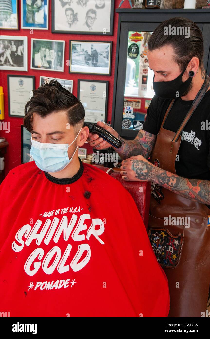 Inside an American style barbershop in the UK Stock Photo