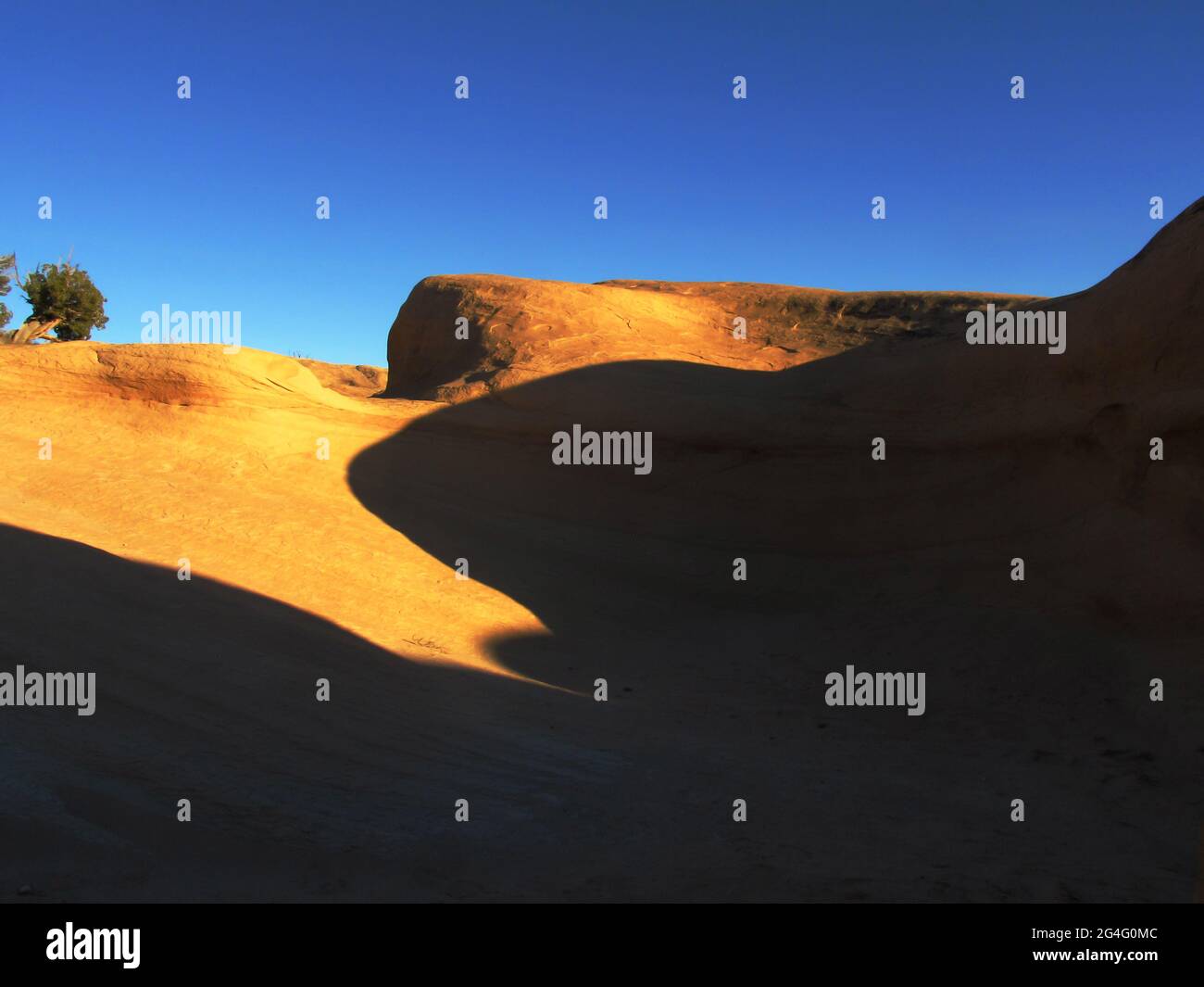 Abstract view of light and shadow on a Sandstone outcrop in the Devils Garden, Escalante, Utah, USA, in the late afternoon Stock Photo