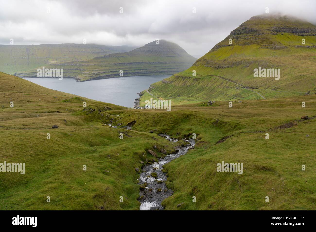 The road to Gjogv on the Faroe Island of Esturoy in the Faroe Islands – looking towards Elduvik Stock Photo