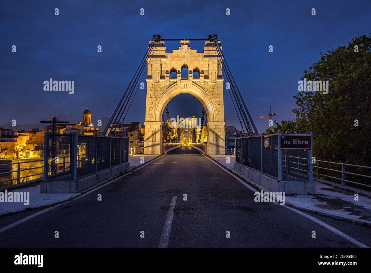 Amposta Bridge, illuminated in the blue hour at twilight (Ebro River, Tarragona, Catalonia, Spain) ESP: Puente de Amposta, iluminado en la hora azul Stock Photo