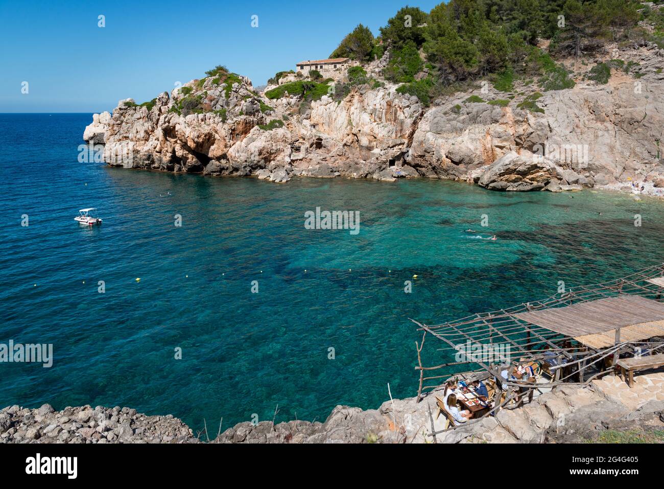 Ca's Patro March beach cafe at Deia on the Balearic isalnd of Mallorca in Spain Stock Photo