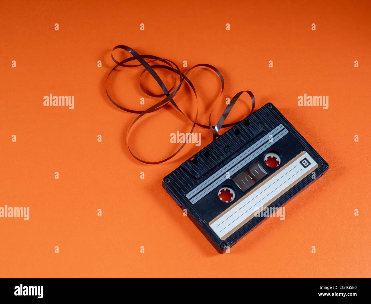 Audio cassette, musicassette with tape draped artistically. Music