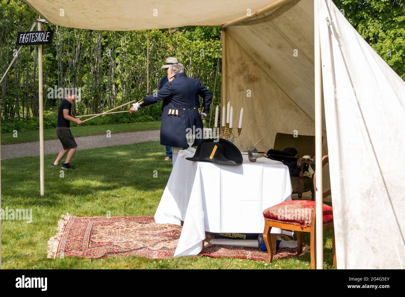 Auning, denmark - 19 June 2021: 1700s day at Gammel Estrup Castle, Fencing school where you can learn to fencing with sabers or swords Stock Photo