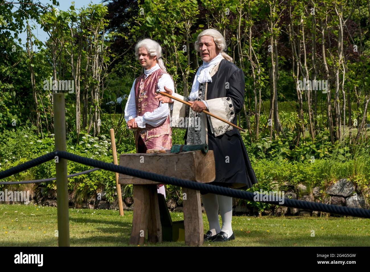 Auning, Denmark - 19 June 2021: 18th century day at Gammel Estrup Castle, People are dressed as in the 18th century and everything passes as then. Peo Stock Photo