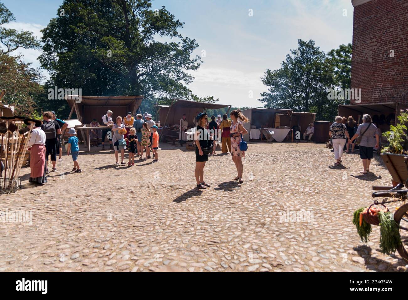 Auning, Denmark - 19 June 2021: 18th century day at Gammel Estrup Castle, People are dressed as in the 18th century and everything passes as then. Bea Stock Photo