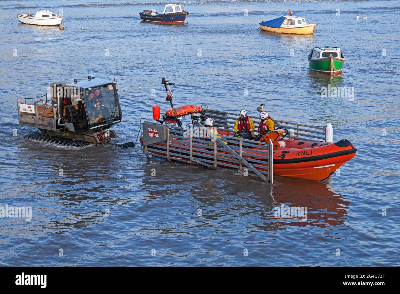 The Atlantic 75 class lifeboat B769 Coventry and Warwickshire with its Loglogic Softrak launch and recovery tractor and trailer in the sea at Weston-super-Mare, UK on 1 February 2015. This lifeboat has since been retired. Stock Photo