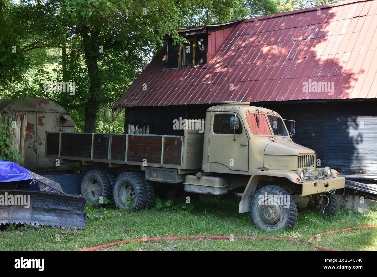 Side view on old all-terrain multi-purpose truck Praga V3S, produced since 1953 in Czechoslovakia, abandoned in the countryside. Stock Photo