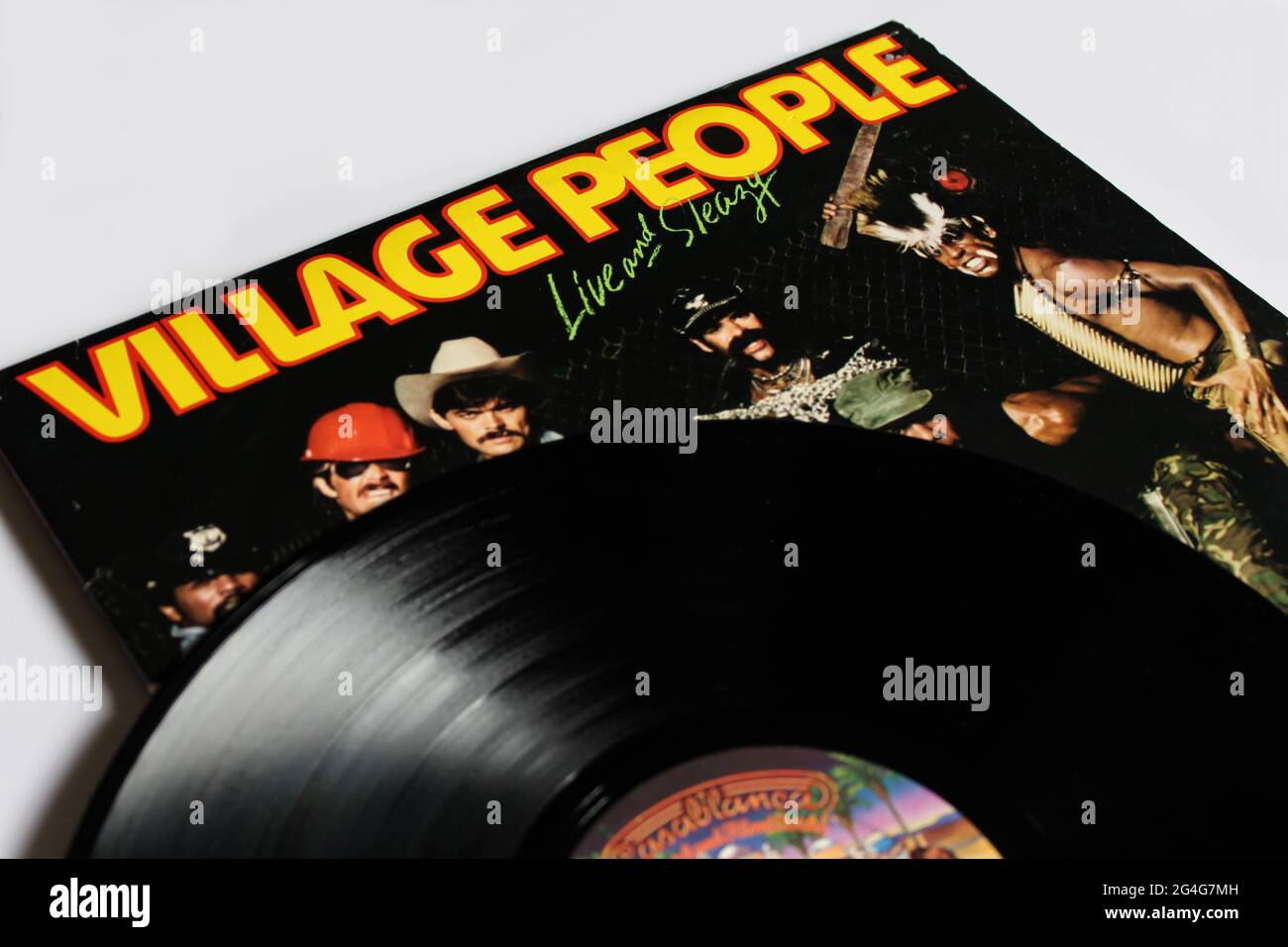 Disco, funk, and soul band, the Village People music album on vinyl record LP disc. Titled: Live and Sleazy album cover Stock Photo