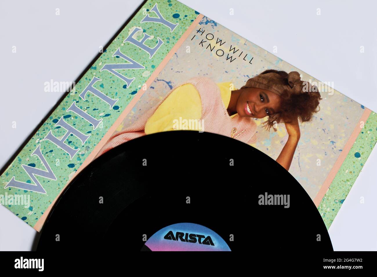 Miami, FL, USA: June 2021: Dance-rock, R&B and pop artist, Whitney Houston music album on vinyl record LP disc. Titled: Whitney single How Will I know Stock Photo