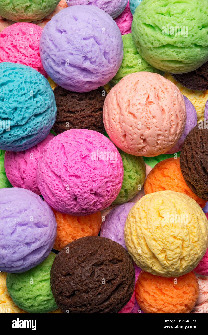 Backgrounds and textures: multicolored scoops of ice cream, large group, close-up shot Stock Photo