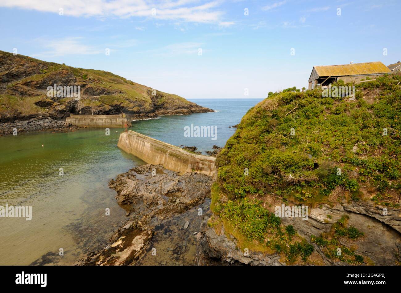 Looking at Port Isaac Harbour Walls and out to sea Stock Photo Alamy