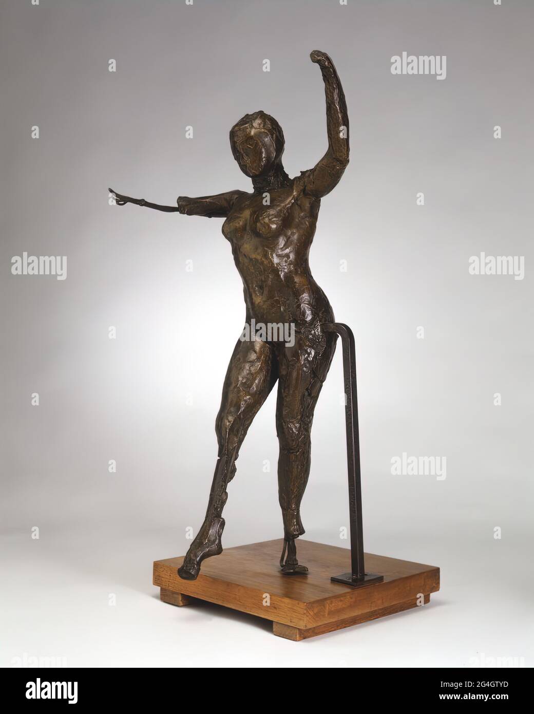 Dancer Moving Forward, Arms Raised, Right Leg Forward, c. 1882-1895/cast 1919-1932. Stock Photo