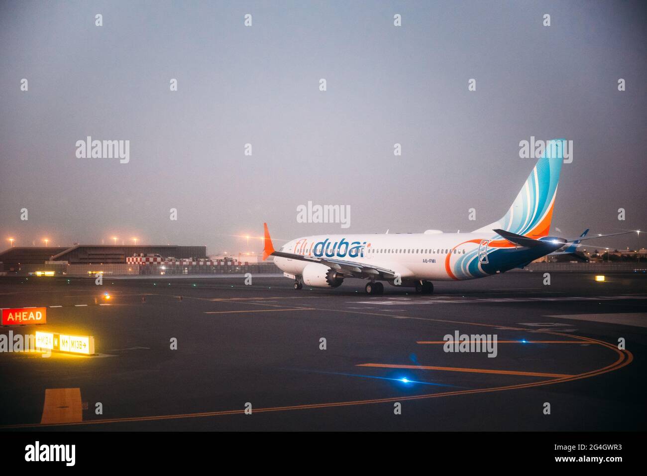 Airline Flydubai Plane Stand At Dubai Airport. Dubai, United Arab Emirates Stock Photo